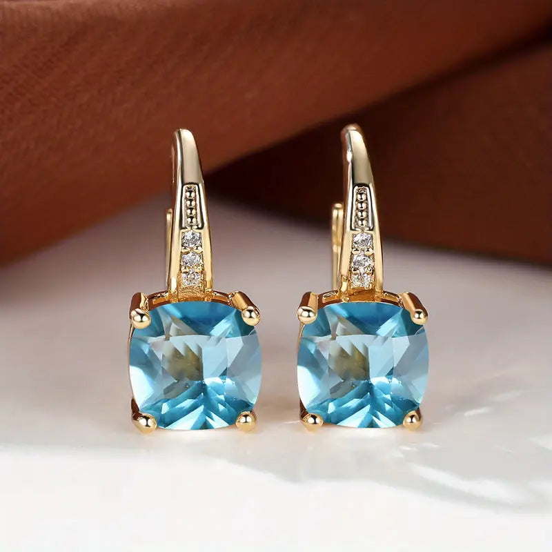 Hoop earrings with a mystical stone and sapphire | Gold