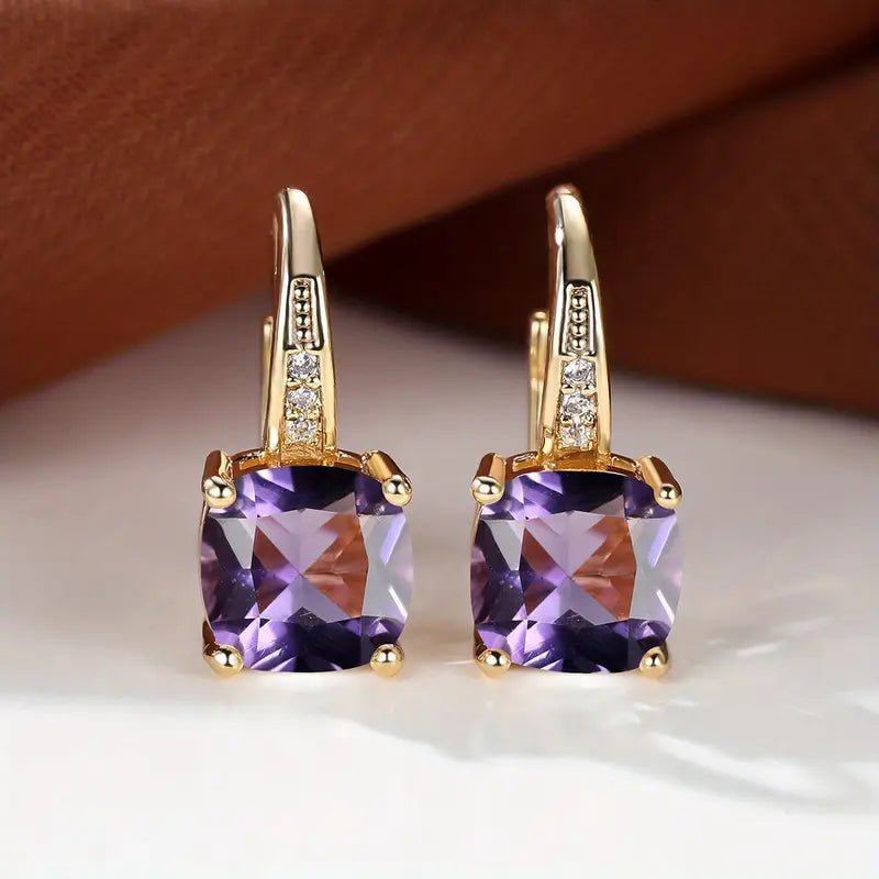 Hoop earrings with a mystical stone and sapphire | Gold