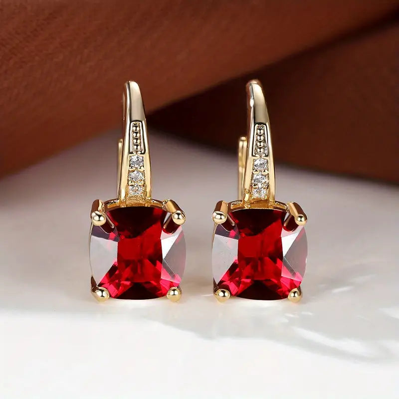 Hoop earrings with a mystical stone and sapphire | Gold