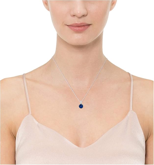 Valgekuldne kaelakee ümmarguse safiiriga