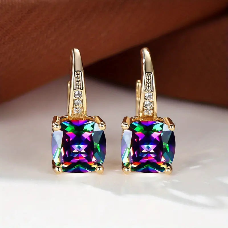Hoop earrings with a mystical stone and sapphire | Gold