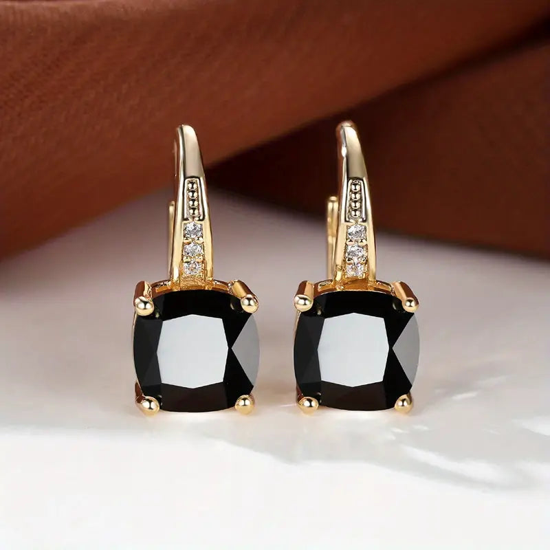 Hoop earrings with a mystical stone and sapphire | Gold