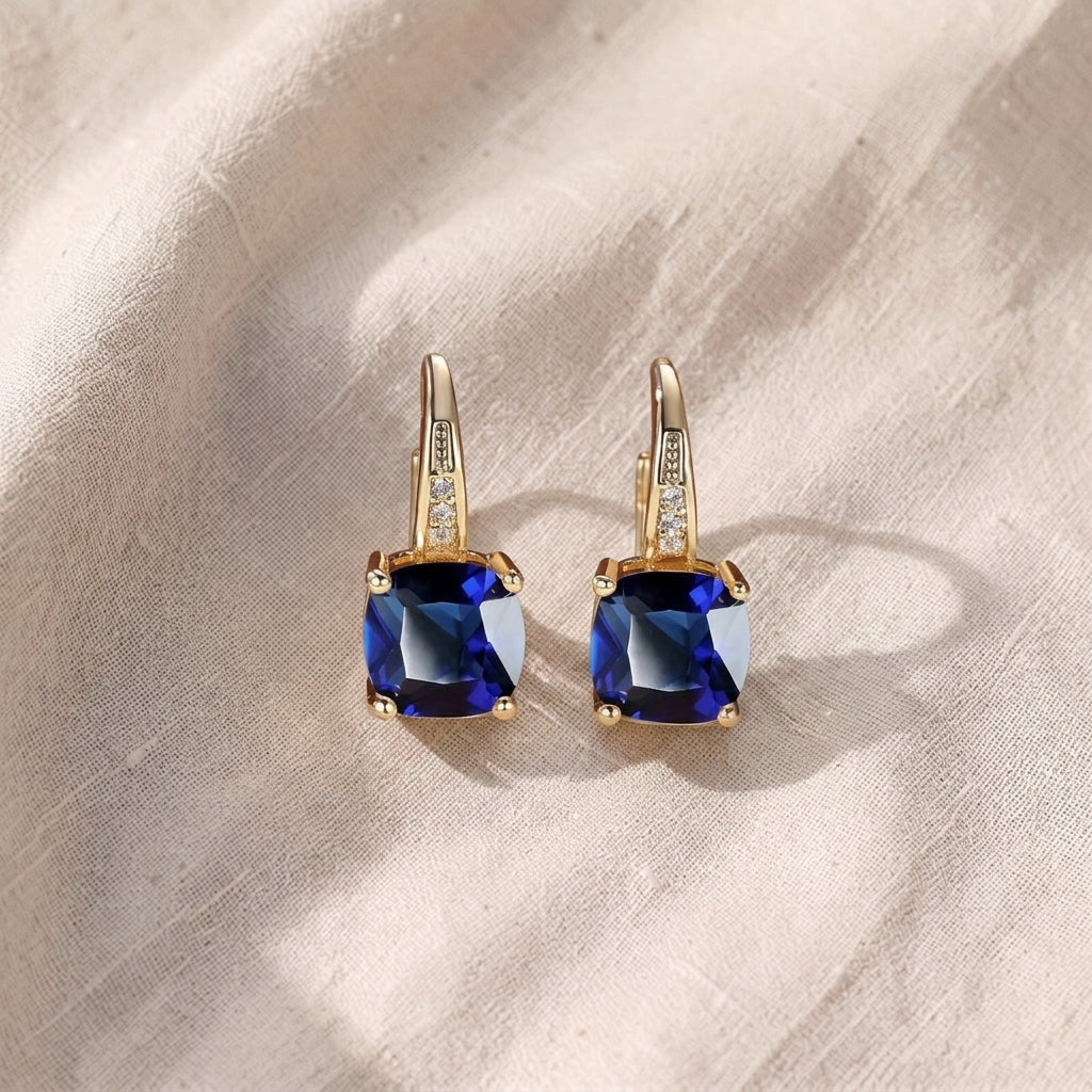 Hoop earrings with a mystical stone and sapphire | Gold