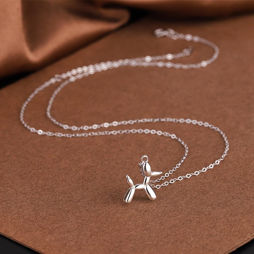 Kaelakee koerakese ja õhupalliga