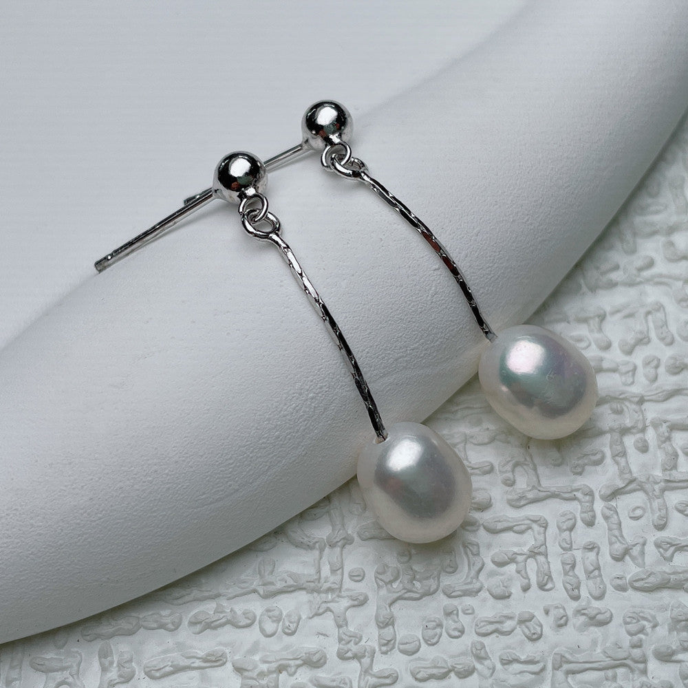 Elegantsed kõrvarõngad pärlitega