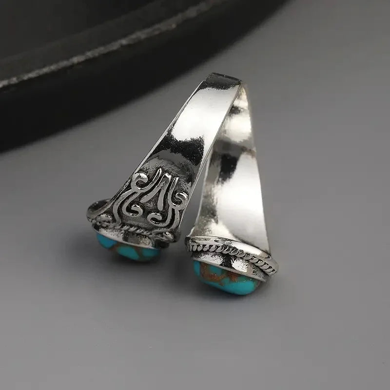 Elegantne vintage sõrmus türkiisi ja ristikesega