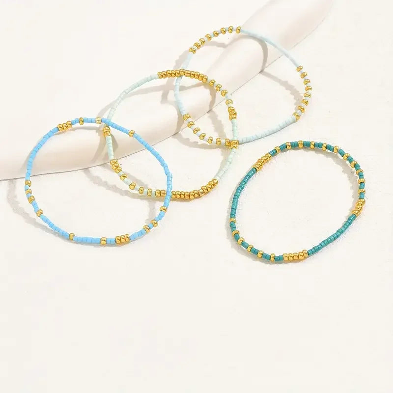 Boho stiilis käevõrude komplekt türkiisiga