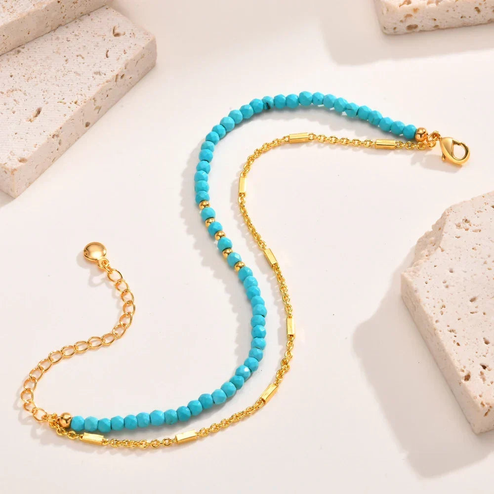 Kuldne topeltketiga käevõru türkiisiga