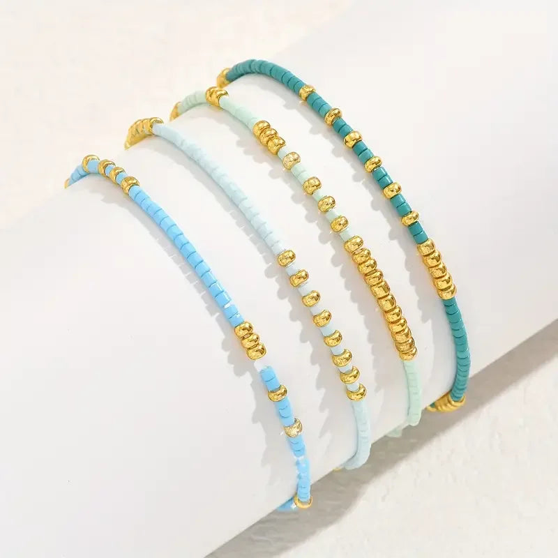 Boho stiilis käevõrude komplekt türkiisiga