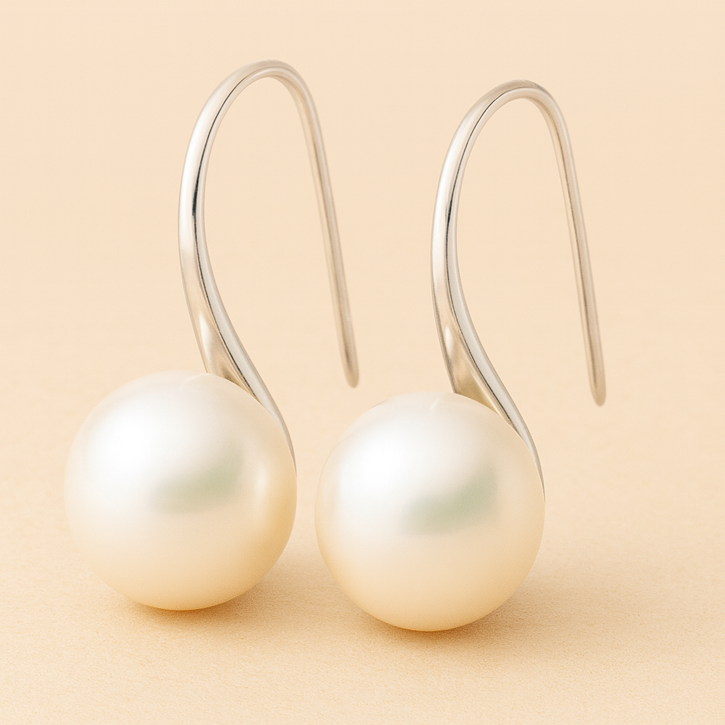 Elegantsed pisarakujulised kõrvarõngad pärlitega