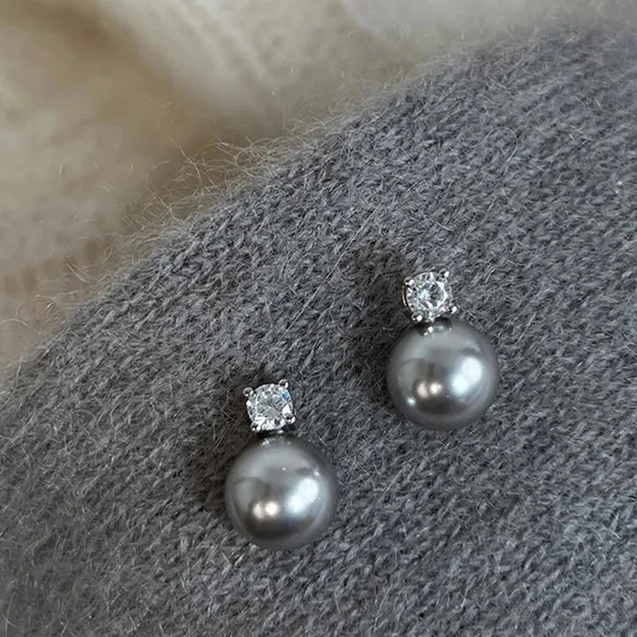 Elegantsed mustad pärlikõrvarõngad tsirkoonidega